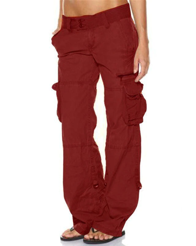 Pantalon cargo rouge pour femme, style décontracté, poches latérales, coupe ample, idéal pour mode urbaine et confort quotidien.