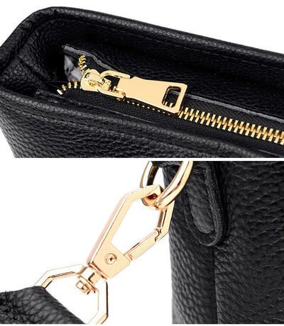 Gros plan sur un sac à main en cuir noir avec fermeture éclair dorée et attache métallique. Accessoire de mode élégant et tendance.