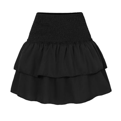 Jupe noire à volants, taille haute, style bohème chic, tissu léger, mode féminine élégante, idéale pour tenues décontractées ou soirées.