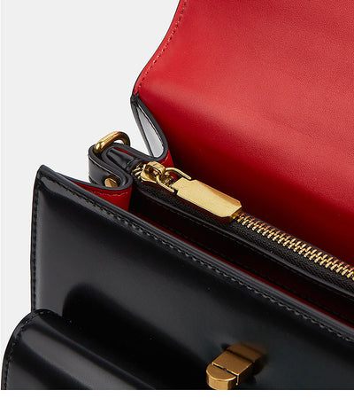 sac vernis noir bandouliere interieur rouge