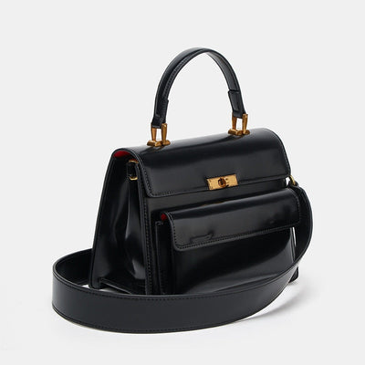 sac vernis noir bandouliere finition dore