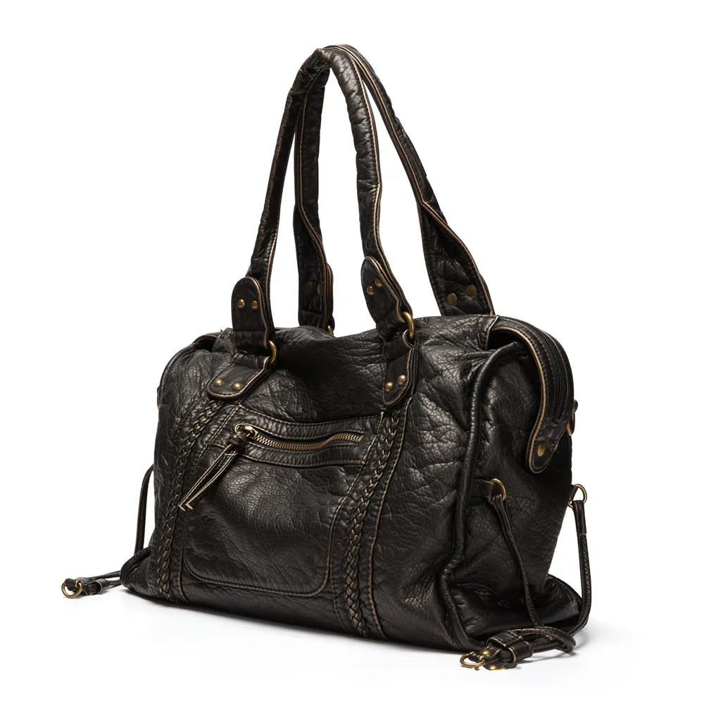 Sac à main en cuir noir élégant avec poignées doubles, fermeture éclair et détails tressés. Accessoire mode femme chic et tendance.