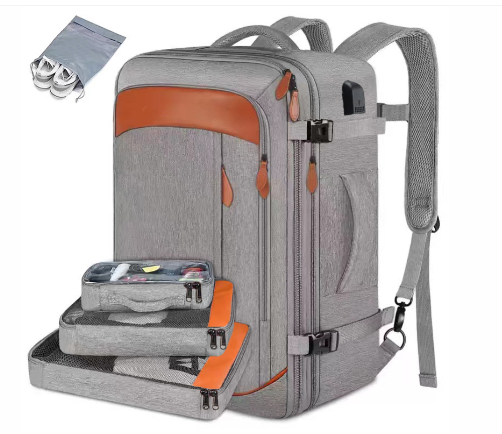 Sac à dos de voyage gris multifonctionnel avec compartiments amovibles, design moderne, idéal pour ordinateur portable, affaires et loisirs.