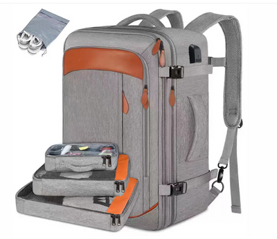 Sac à dos de voyage gris multifonctionnel avec compartiments amovibles, design moderne, idéal pour ordinateur portable, affaires et loisirs.