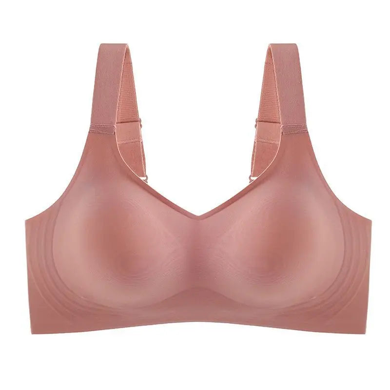 Soutien-gorge sans couture couleur chair, bretelles larges, design lisse et confortable, idéal pour un maintien discret et quotidien.