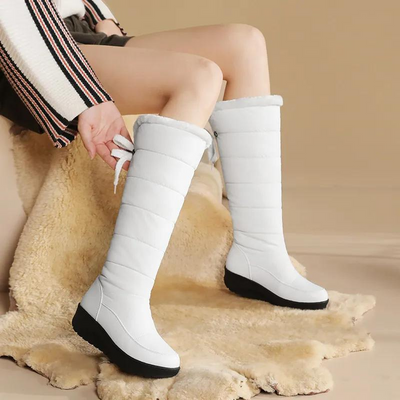 Bottes d'hiver pour femmes avec doublure en fourrure - à hauteur du genou et chaudes pour les jours de neige
