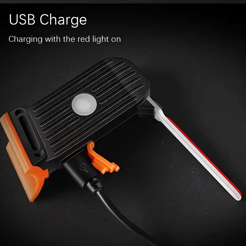 Chargeur USB noir avec lumière rouge allumée, câble connecté. Design compact, idéal pour appareils électroniques portables. Accessoire essentiel.