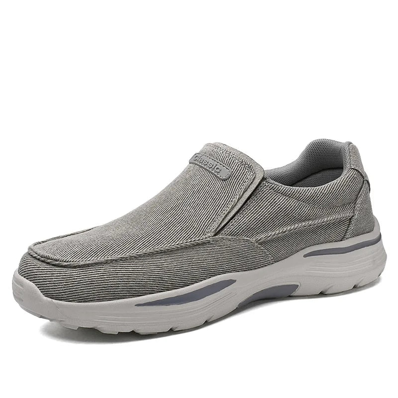 Chaussure décontractée grise pour homme, style mocassin, semelle épaisse antidérapante, tissu respirant, idéale pour marche et confort quotidien.