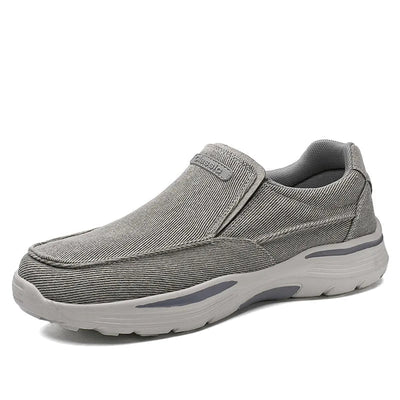 Chaussure décontractée grise pour homme, style mocassin, semelle épaisse antidérapante, tissu respirant, idéale pour marche et confort quotidien.