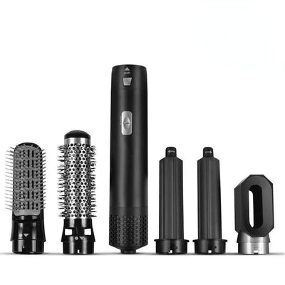 Sèche-cheveux multifonction noir avec cinq accessoires interchangeables: brosse lissante, brosse ronde, concentrateur, et deux embouts coiffants.
