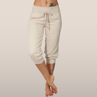 Pantalon capri beige pour femme, taille basse, avec cordon de serrage, idéal pour l'été et le yoga, confort et style décontracté.