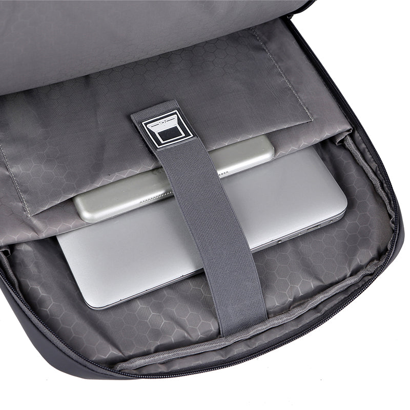 Sac à dos antivol avec compartiment pour ordinateur portable, tablette et smartphone, intérieur gris, idéal pour voyage et travail.