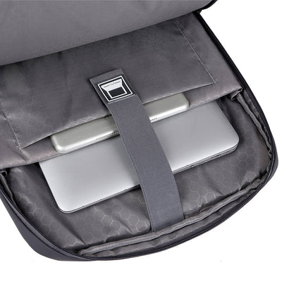 Sac à dos antivol avec compartiment pour ordinateur portable, tablette et smartphone, intérieur gris, idéal pour voyage et travail.