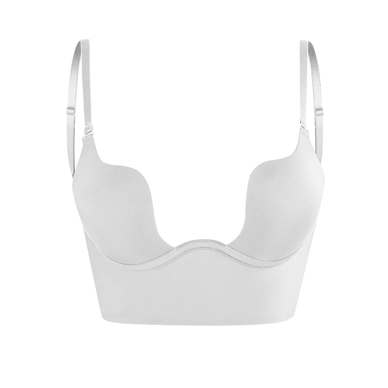 Soutien-gorge blanc plongeant sans couture, bretelles réglables, design moderne, lingerie féminine confortable, idéal pour vêtements décolletés.