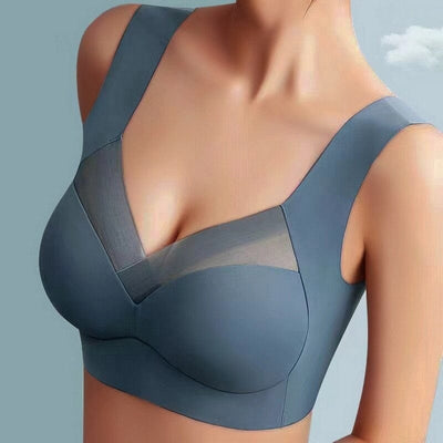 Soutien-gorge bleu sans couture avec bretelles larges et empiècement en tulle, offrant confort et maintien optimal pour un look élégant et moderne.