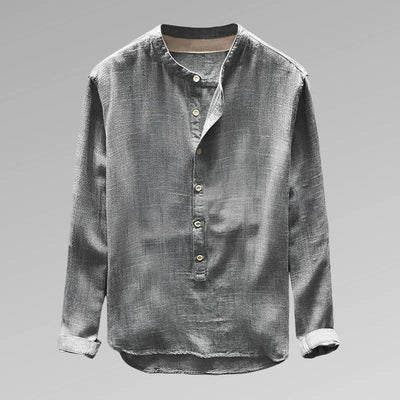 Chemise en lin gris pour homme avec col mao, manches longues et boutons en bois, style décontracté et élégant, idéale pour toutes saisons.