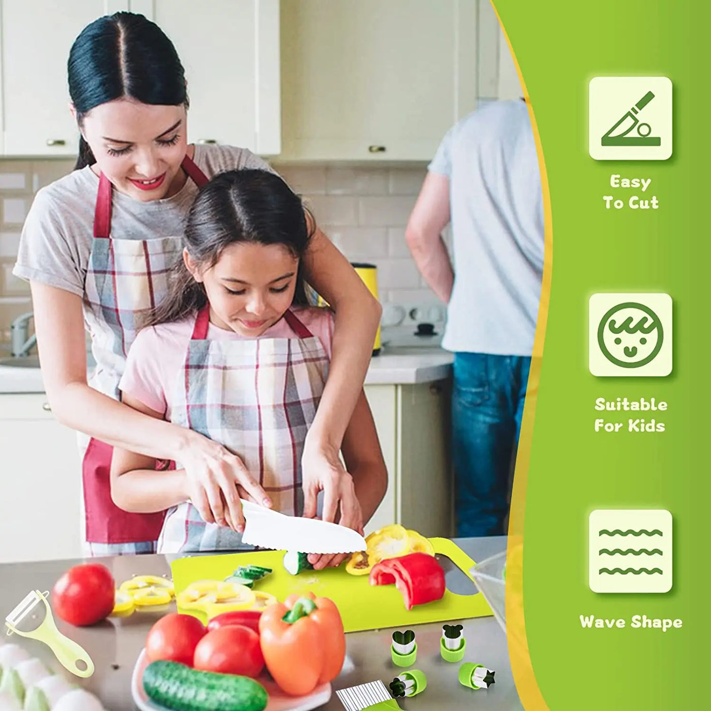 Mère et fille coupant des légumes dans une cuisine moderne, planche à découper verte, couteau sécurisé pour enfants, ambiance familiale, cuisine saine.
