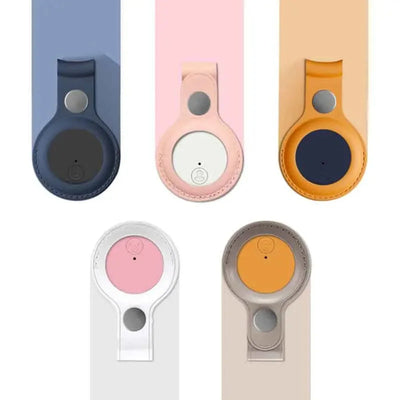 Cinq porte-clés en cuir pour AirTag, couleurs variées : bleu, rose, beige, blanc, orange. Accessoires de protection élégants et fonctionnels.