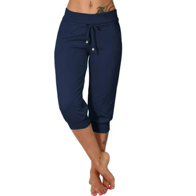 Pantalon capri bleu marine pour femme, taille élastique avec cordon, coupe décontractée, idéal pour le sport ou détente, mode féminine tendance.