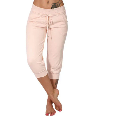 Pantalon de jogging rose pour femme, taille basse, avec cordon de serrage, coupe trois-quarts, idéal pour le sport et détente.