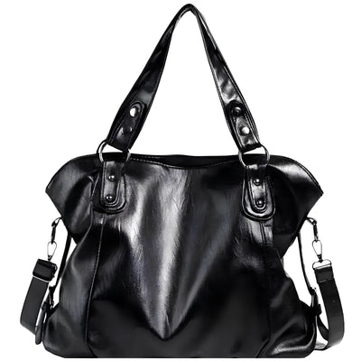 Sac à main en cuir noir brillant avec anses robustes et bandoulière amovible, design élégant et moderne, idéal pour la mode féminine.