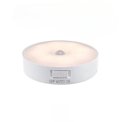 Veilleuse LED ronde blanche avec capteur de mouvement, interrupteur à trois positions (OFF, AUTO, ON), éclairage doux pour chambre ou couloir.