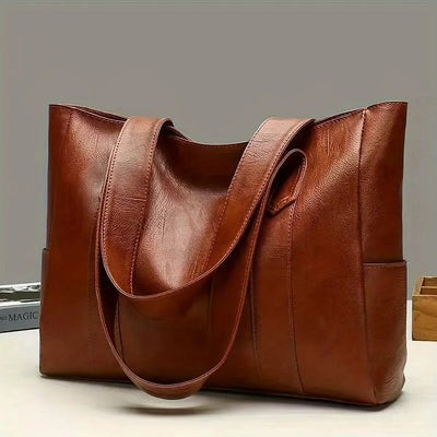 Sac à main en cuir marron élégant, design moderne, idéal pour femmes. Accessoire mode tendance, parfait pour le quotidien et les occasions spéciales.