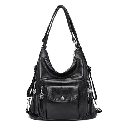 Sac à main en cuir noir élégant avec bandoulière, poches zippées et détails métalliques. Accessoire mode femme chic et pratique.