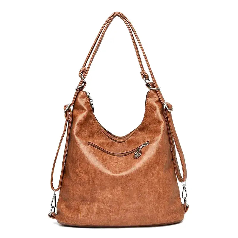 Sac à main en cuir marron, design élégant avec poche zippée avant, bandoulière ajustable, idéal pour mode femme, accessoires tendance.