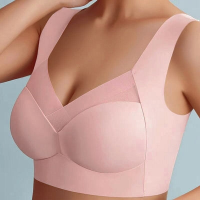 Soutien-gorge rose sans couture, design confortable, bretelles larges, tissu doux, idéal pour un maintien optimal et un style élégant.