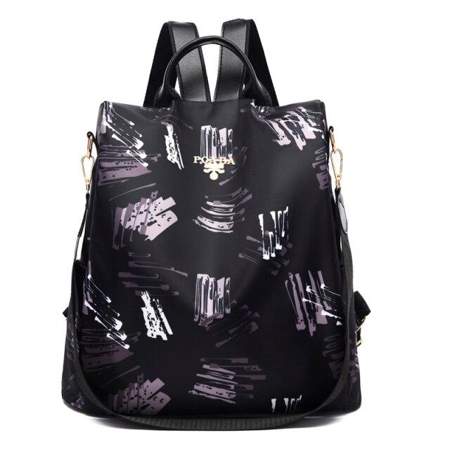 Sac à dos noir élégant avec motifs abstraits violets, design moderne, bretelles ajustables, idéal pour la mode urbaine et le quotidien.