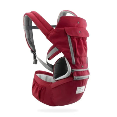 Porte-bébé ergonomique rouge, design moderne, bretelles rembourrées, soutien lombaire, idéal pour nouveau-nés et jeunes enfants.