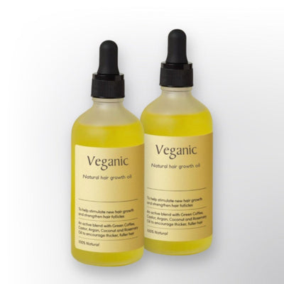 Deux flacons d'huile capillaire Veganic pour la croissance des cheveux, avec pipettes, ingrédients naturels : café vert, ricin, argan, coco, romarin.